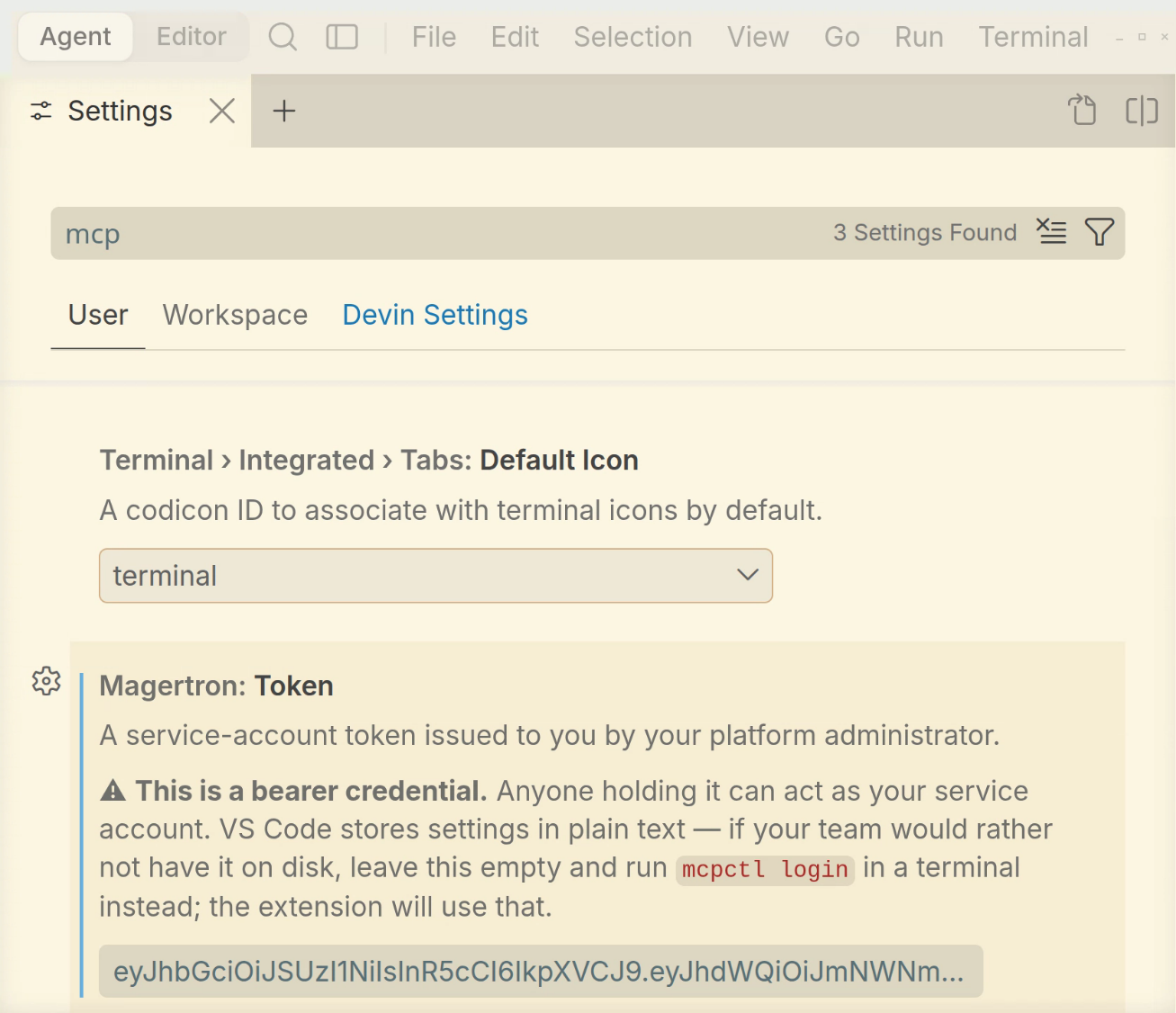 Devin Settings showing the Magertron Token field, with a warning that the value is a bearer credential stored in plain text